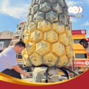 Well Chip Group CSR activity at Kedai Pajak Well Chip Pekan Nanas, sponsoring repainting works for the pineapple landmark.