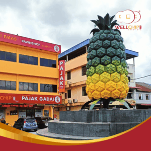 Well Chip Group CSR activity at Kedai Pajak Well Chip Pekan Nanas, sponsoring repainting works for the pineapple landmark.